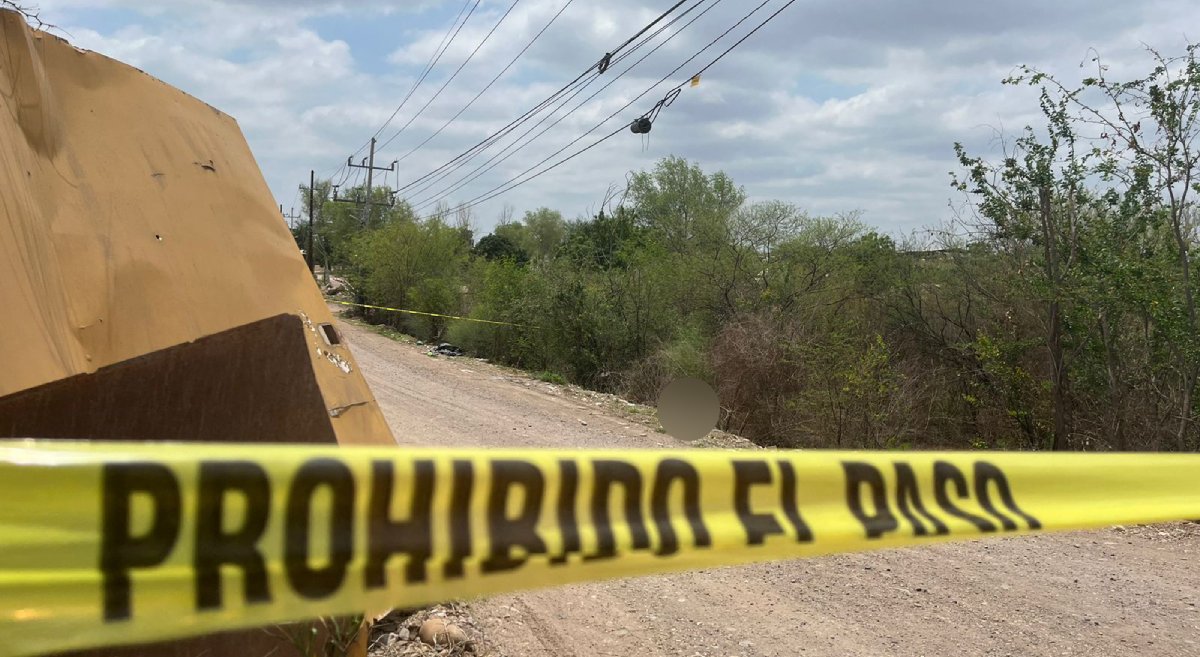 Encobijado y encintado abandonan un cadáver en la colonia Piggy Back de Culiacán