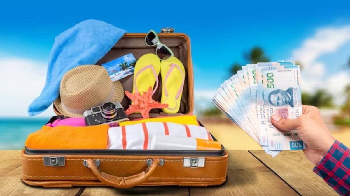 Maleta con artículos de playa y dinero en billetes