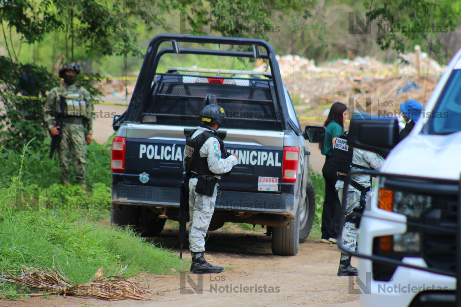 Ejercito, Guardia Nacional y Policía Estatal resguardan lugar hallazgo cuerpo sin vida