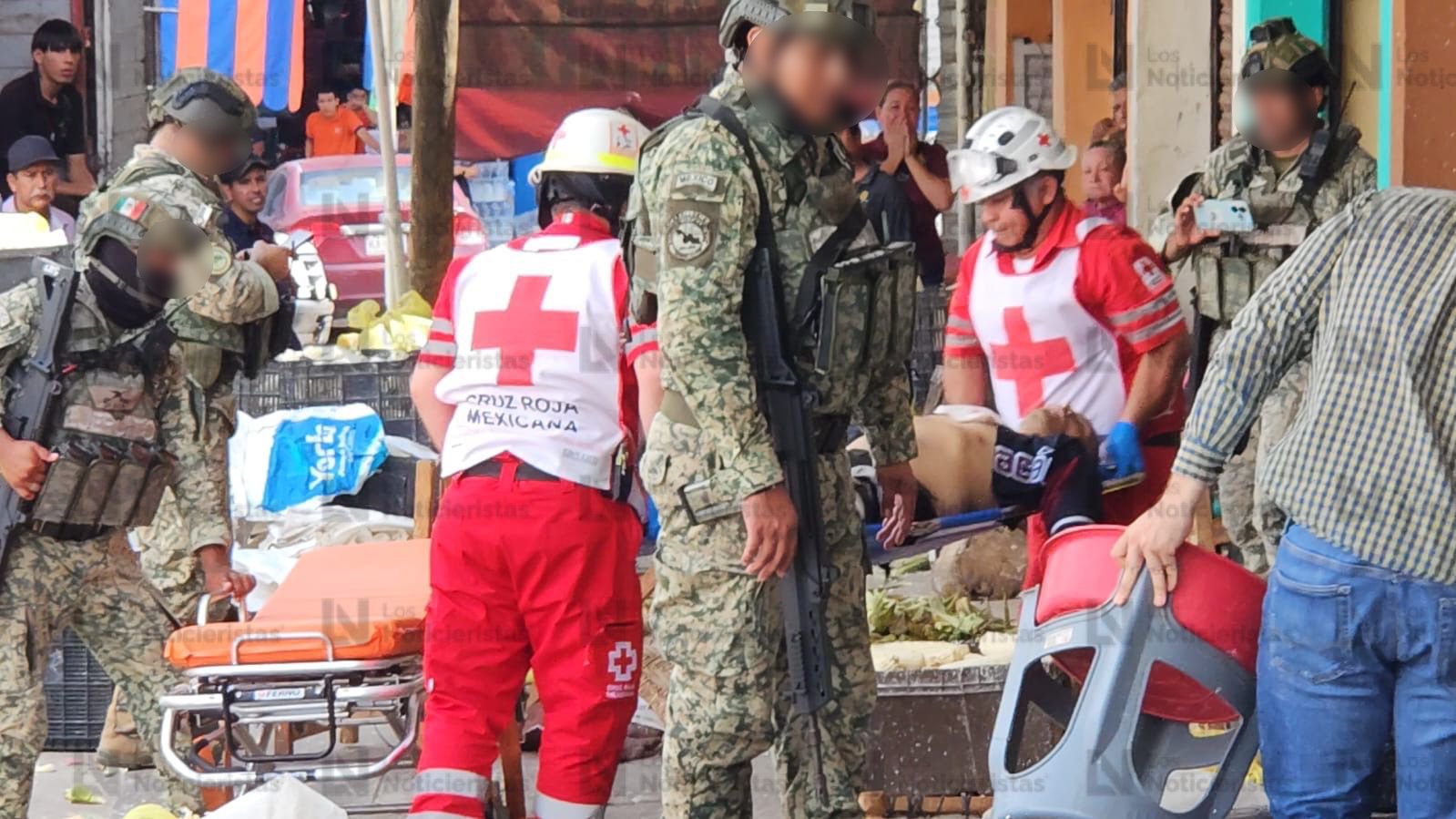 ataque a balazos en mercado de abastos en culiacan ambulancia