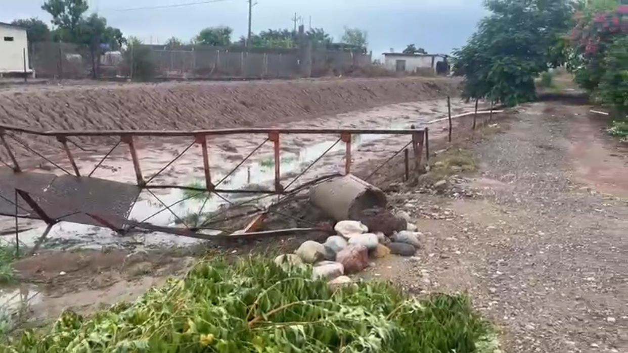 canales desbordados por lluvias en culiacan