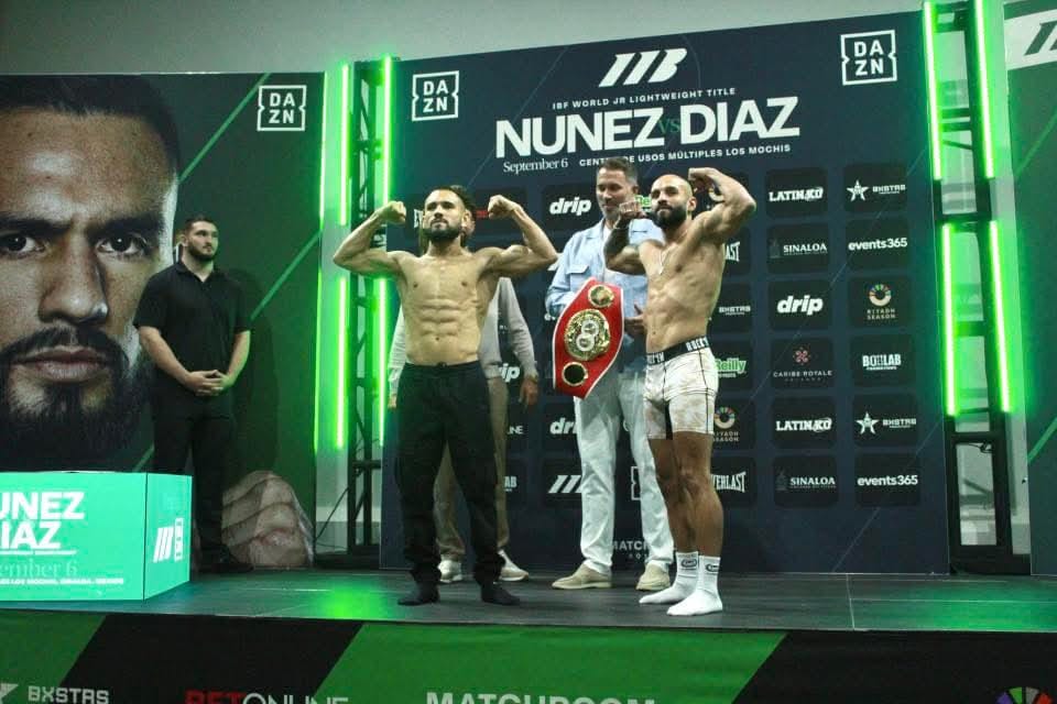 Eduardo Núñez y Christopher Díaz en el pesaje
