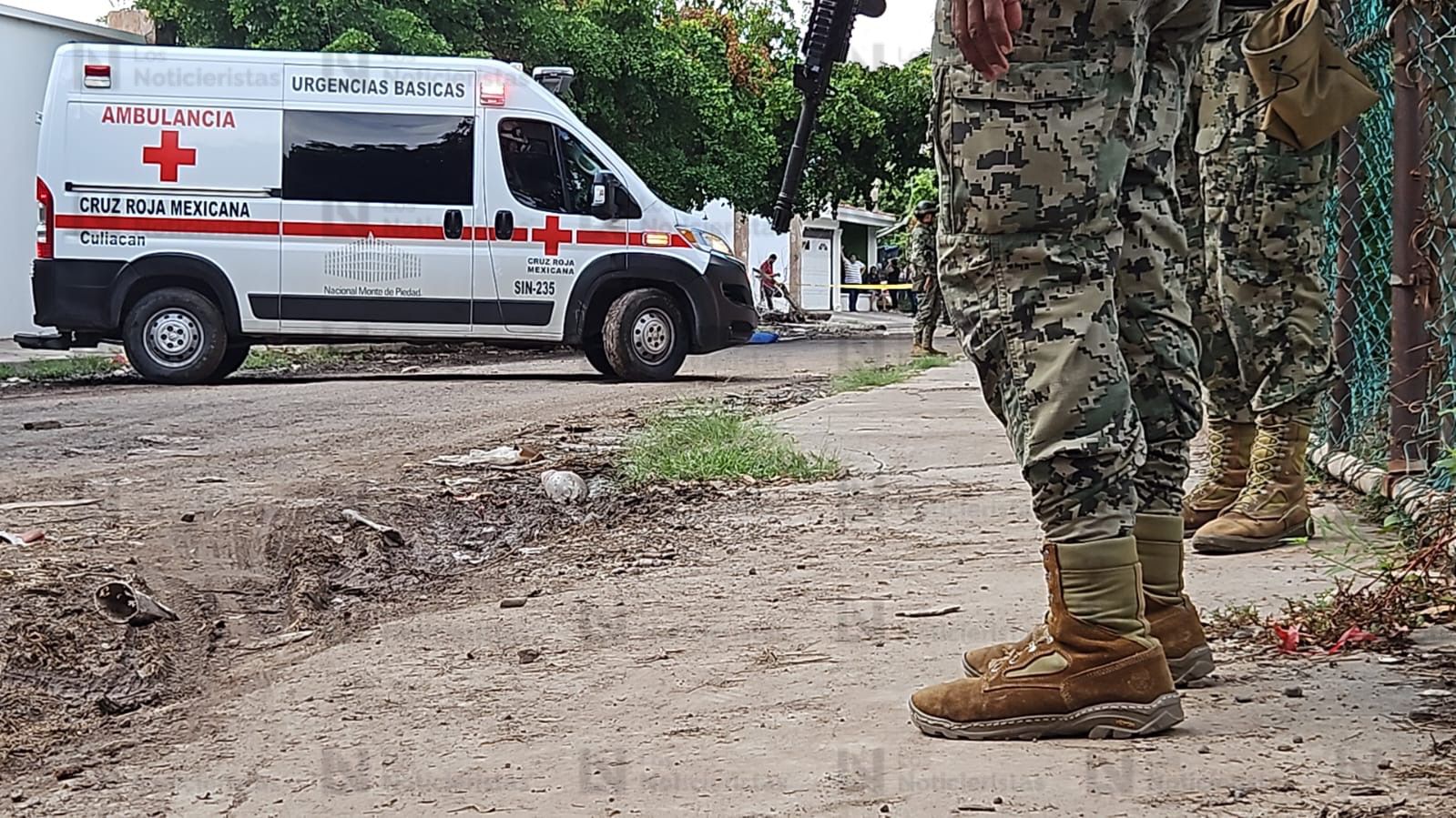 Autoridades en lugar donde dejaron a pareja ejecutada en Bachigualato de Culiacán , Sinaloa