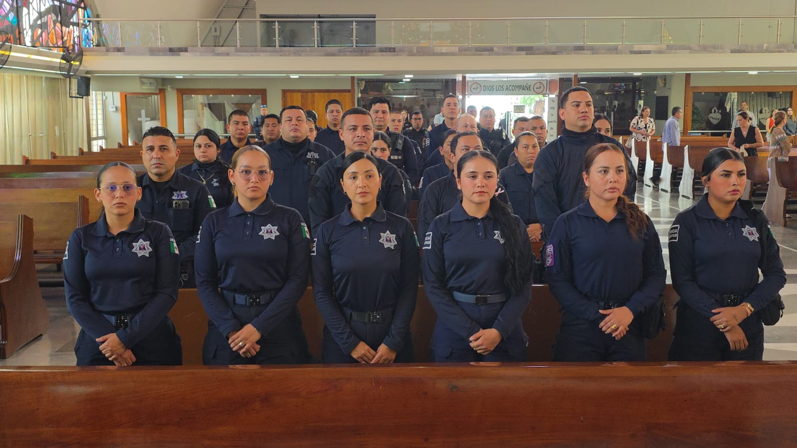 Policías en misa en su honor en La Lomita, de Culiacán