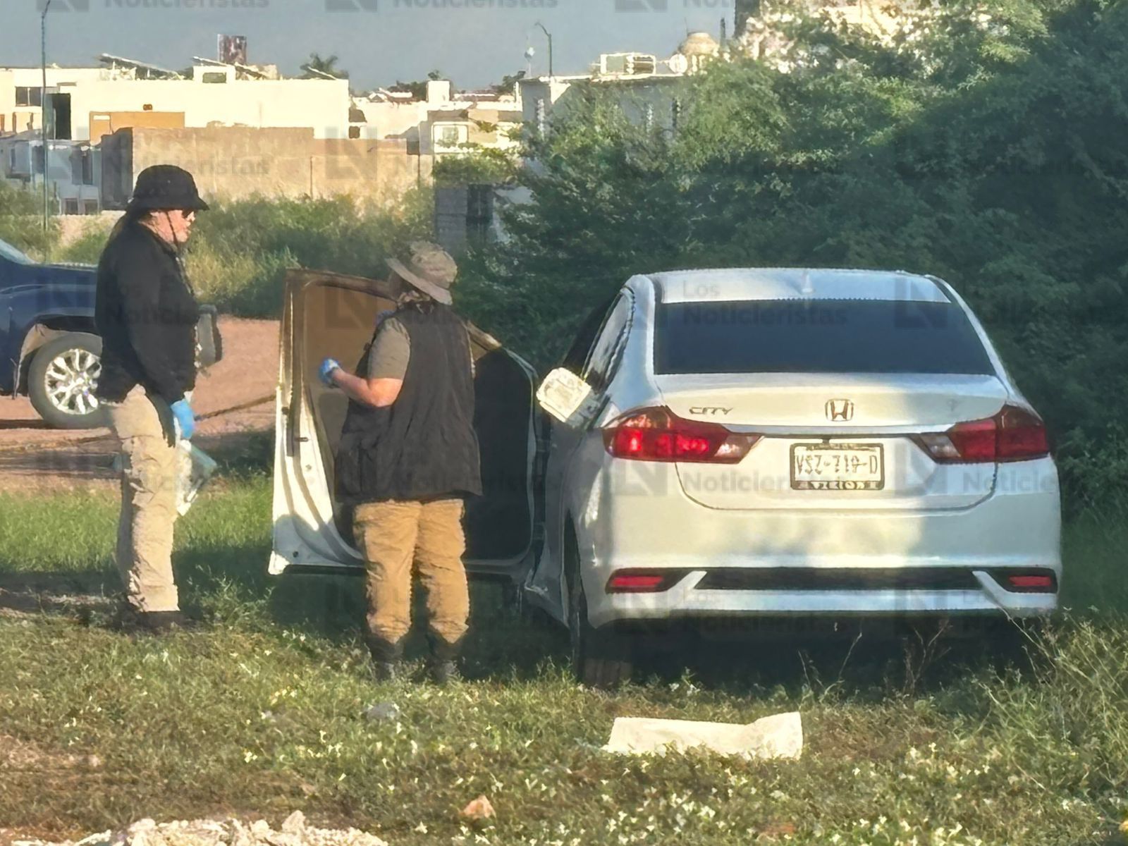 Hallan cuerpo semicalcinado en vehículo en Culiacán
