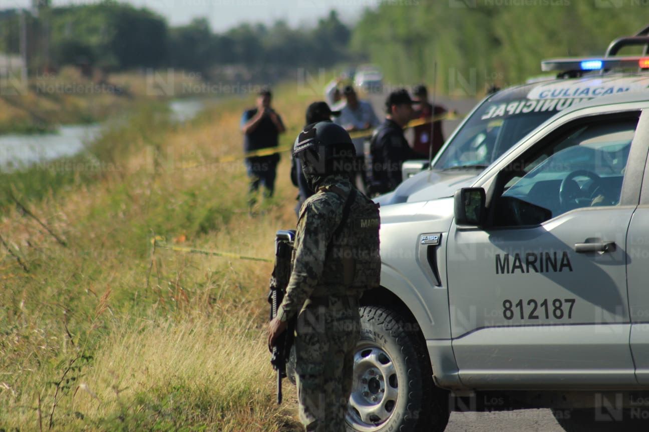 Policía Municipal y Marina localizan a dos ejecutados en el Canal 7 de Aguaruto, Culiacán, Sin.