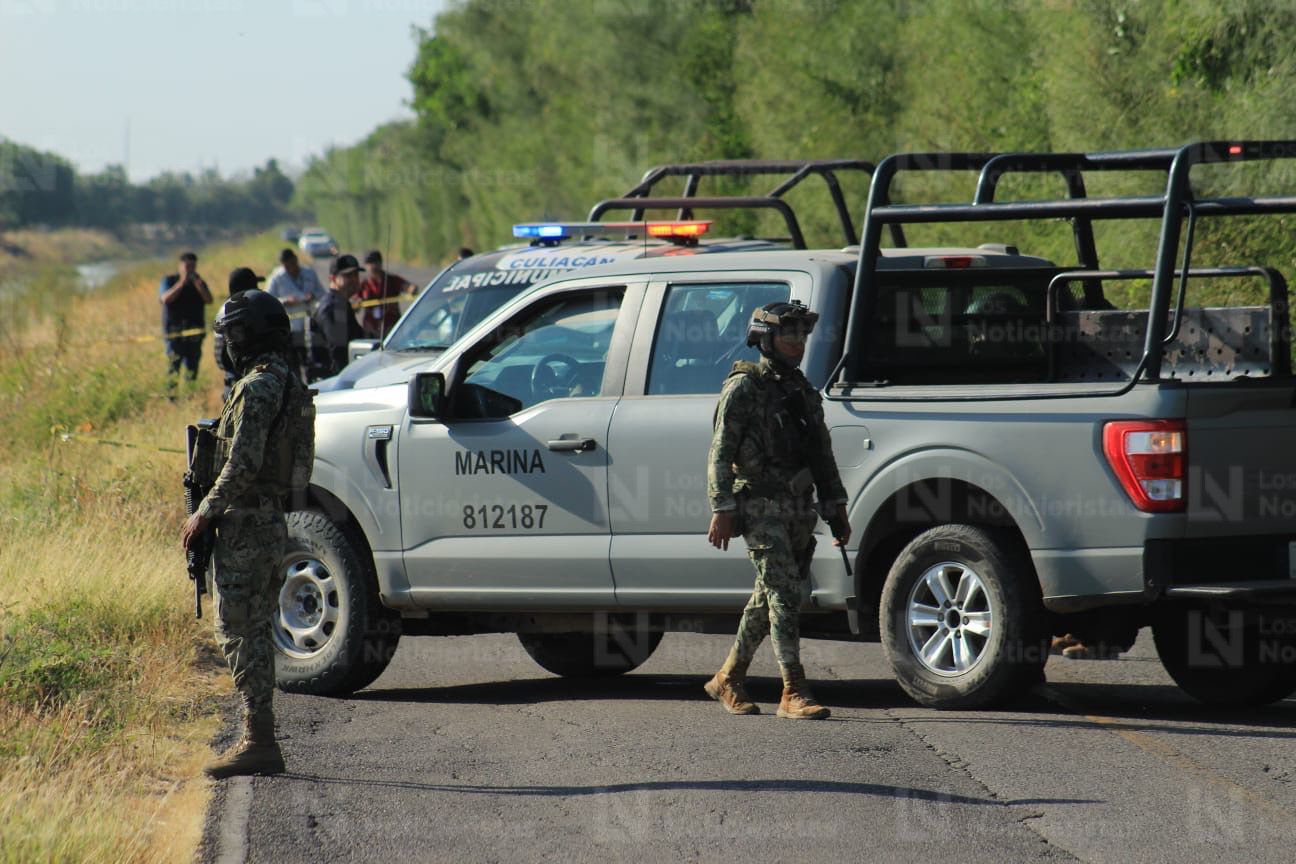 Policía Municipal y Marina localizan a dos ejecutados en el Canal 7 de Aguaruto, Culiacán, Sin.