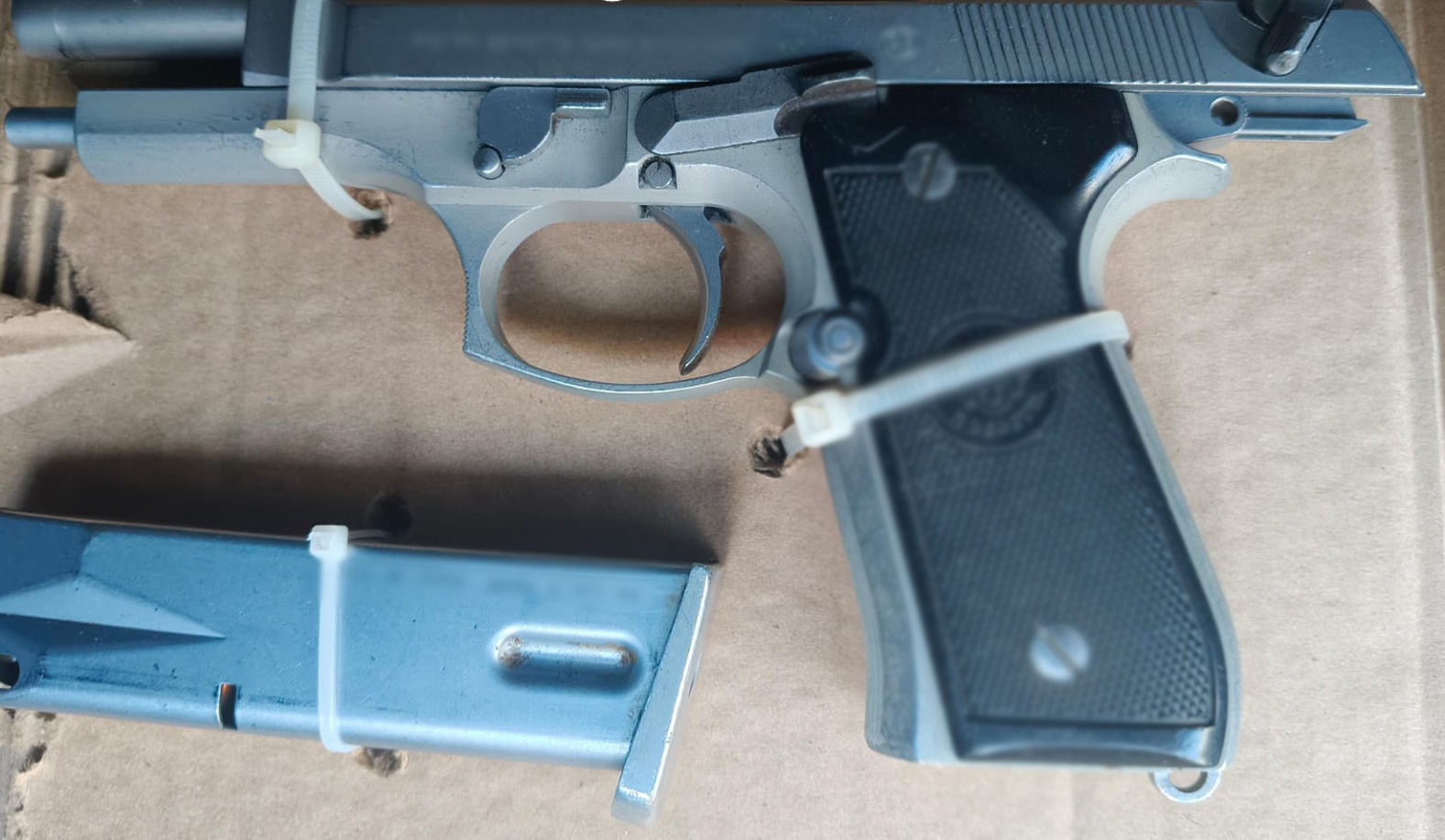 Arma corta asegurada