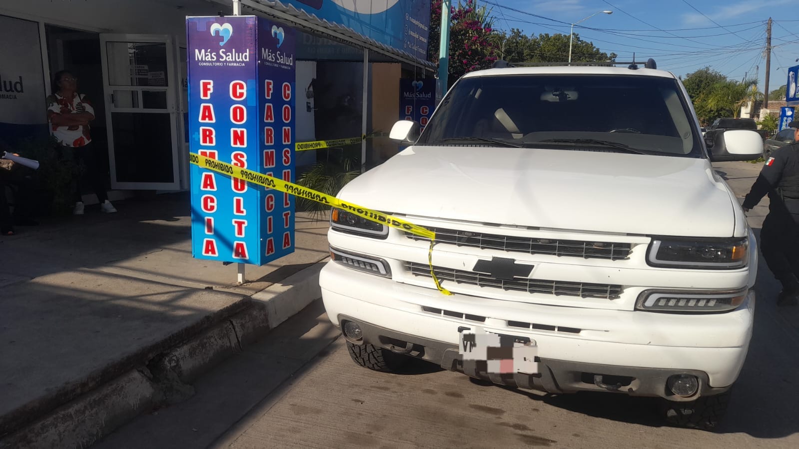camioneta Chevrolet de color blanco