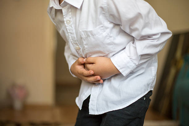 Intoxicación alimentaria en niños. Foto temática