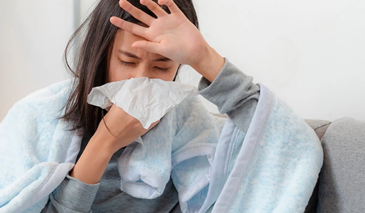 Mujer con gripe