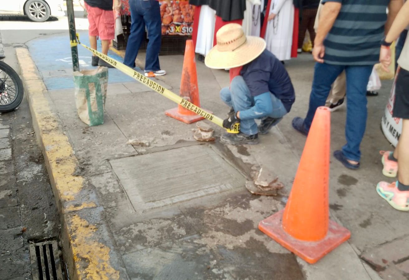 reparacion de banquetas en mercadito de mazatlan