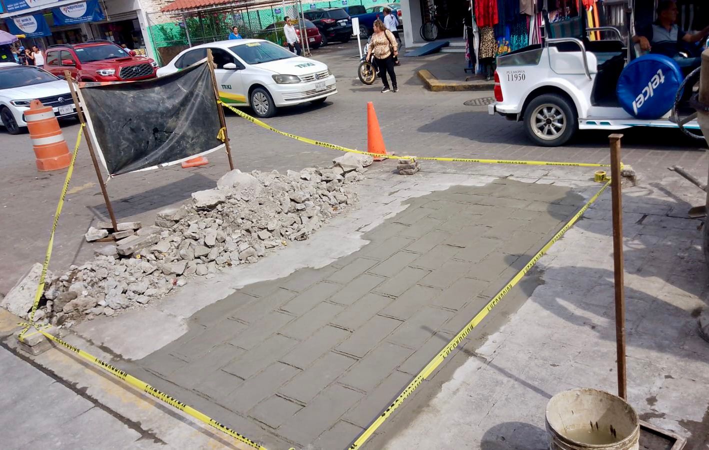 reparacion de banquetas en mercadito de mazatlan