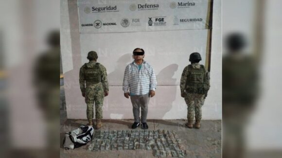 Detiene Defensa a sujeto que transportaba mochila con más de 700 mil dólares en Culiacán, Sinaloa