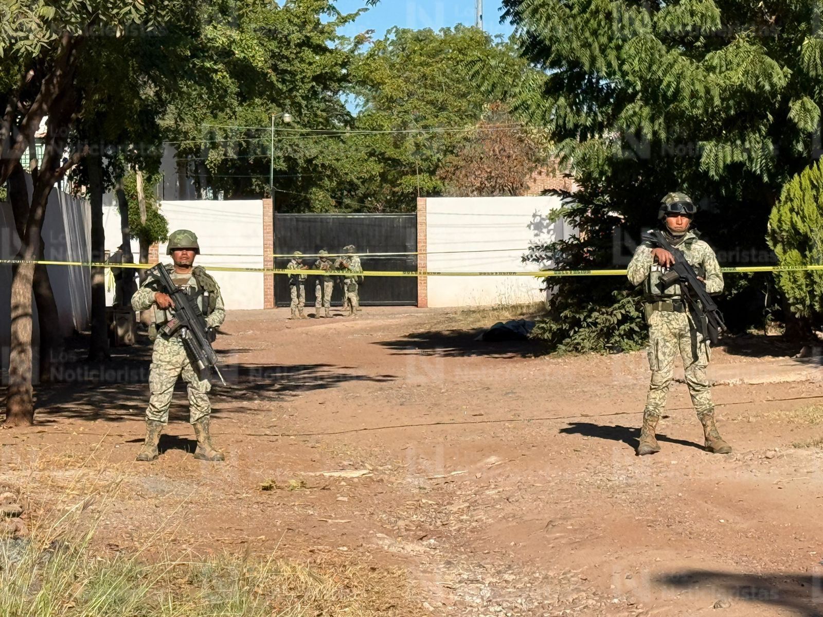 Cadáver envuelto en una sábana en la Agustina Ramírez, Culiacán, Sin.