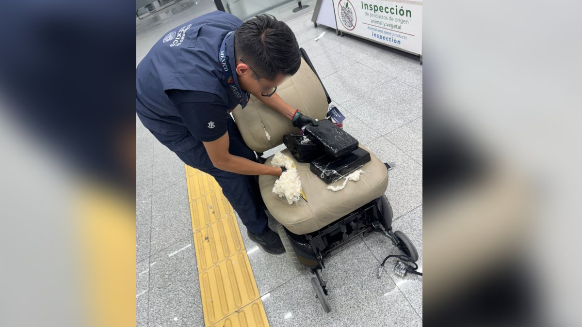 Aseguran más de 8 kilos de cocaína ocultos en silla de ruedas en el AICM