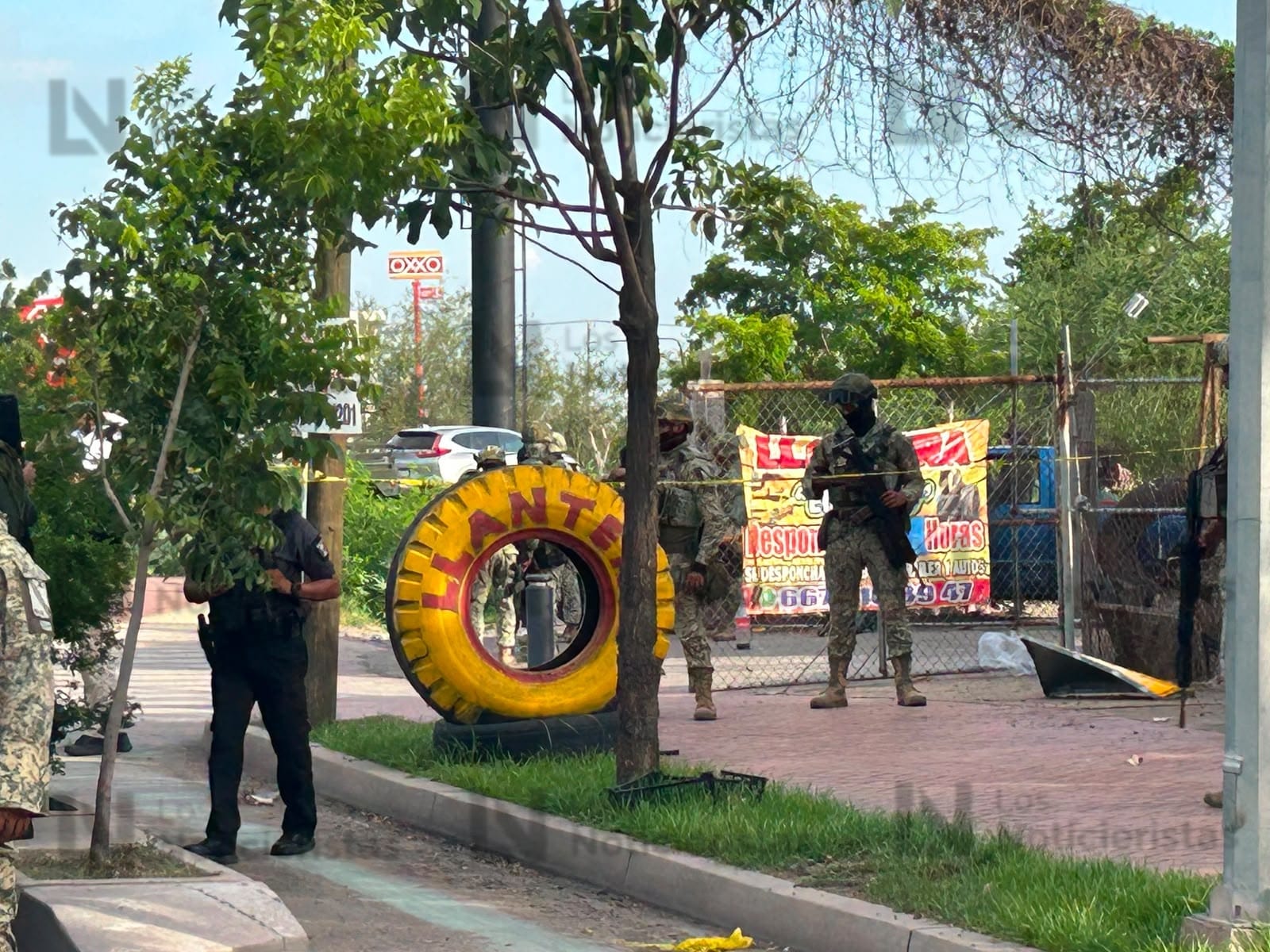 Ejecutan a dos hombres en una llantera del sector Villas del Río, Culiacán