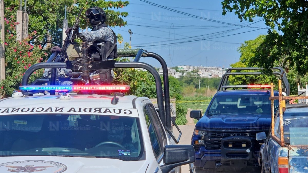 encuentran asesinada a una persona en las cucas de culiacan camionetas